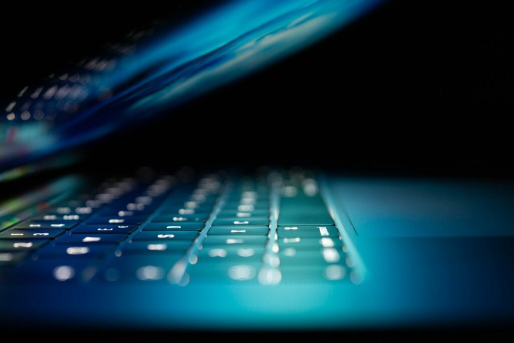 Cybersecurity engineer workstation with code